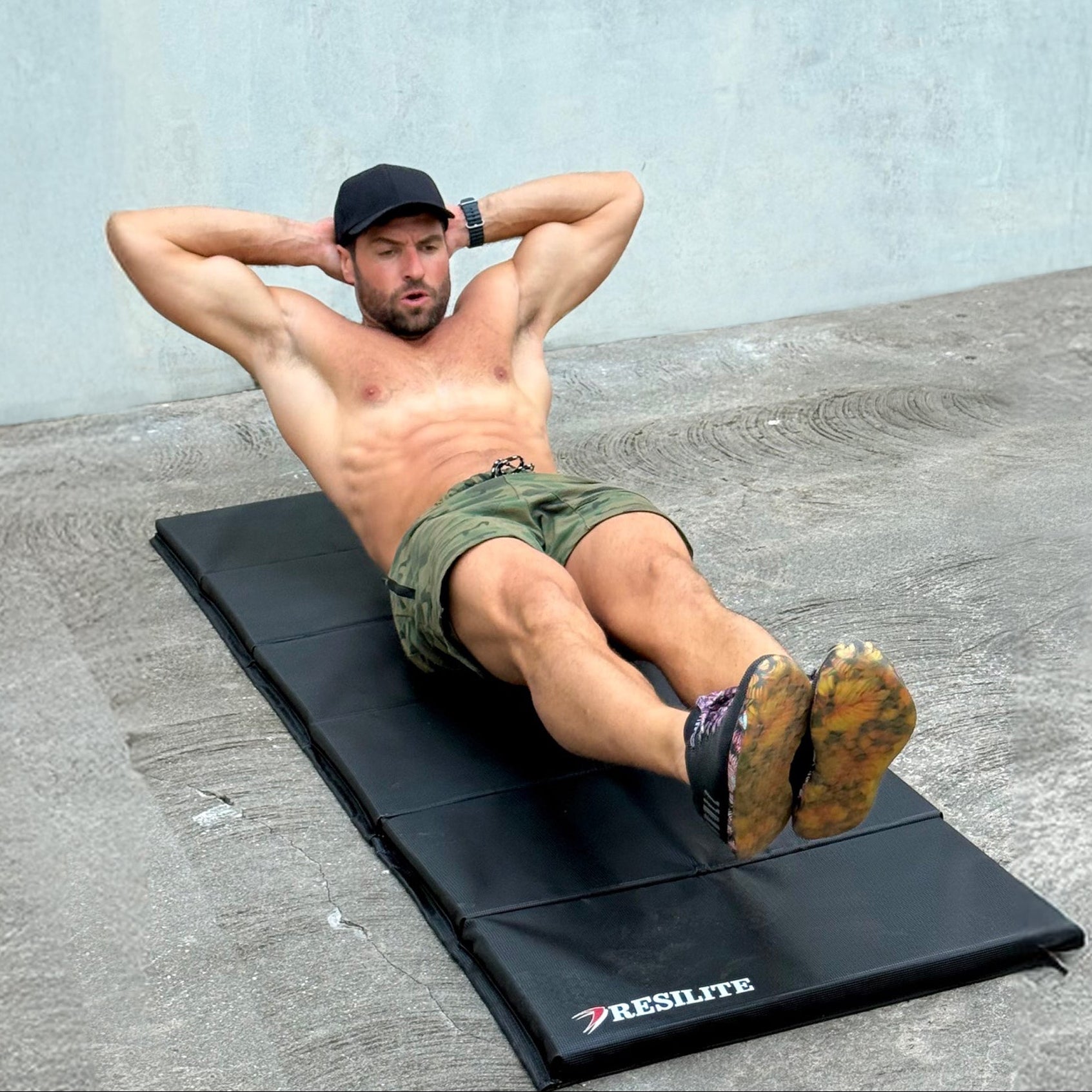 Jimmy Drew training on a premium Resilite OmniMat fitness mat