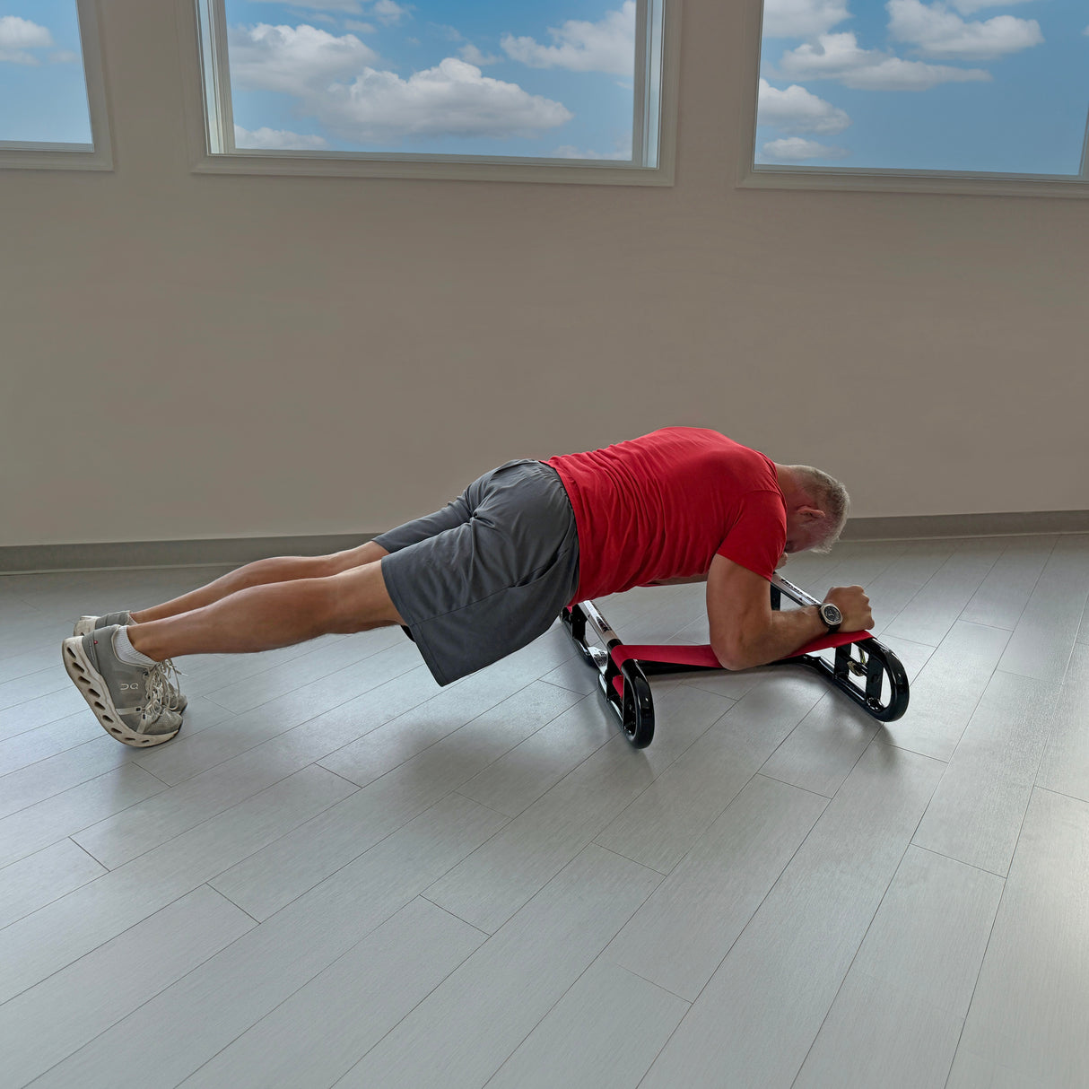 Man using The Slack Liner for plank exercise targeting core and stabilizer muscles