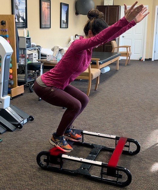 Patient using The Slack Liner for physical therapy balance and rehabilitation training