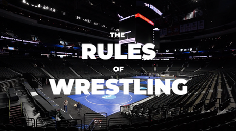 NCAA Championship wrestling arena with ‘The Rules of Wrestling’ graphic, representing an introduction to wrestling scoring and match rules.