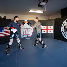 Merab training in his home gym on Resilite hybrid mats