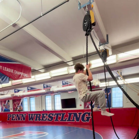 UPenn wrestler using Infiniti battle rope for strength and conditioning training