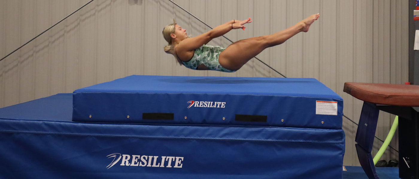 Young gymnast trains using Resilite Gymnastics Mats