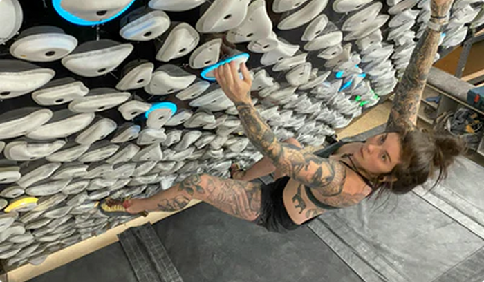 Resilite Climbing mats seen below a Kilter Climbing Wall. 