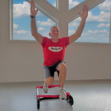 Athlete doing squats on The Slack Liner to improve core strength and balance