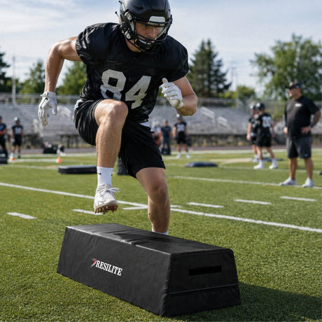 football player performing step-over drill using agility dummy for footwork training